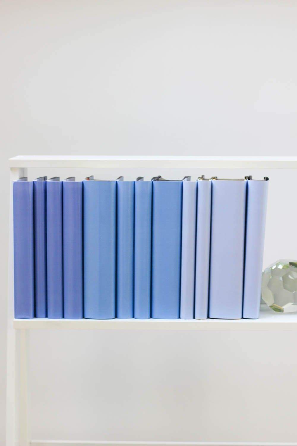 Set of styled periwinkle books made with periwinkle book covers
