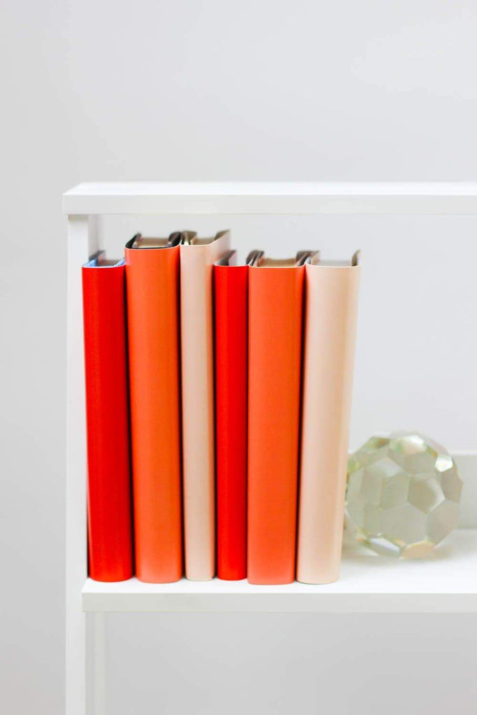 Set of styled red books made with red book covers