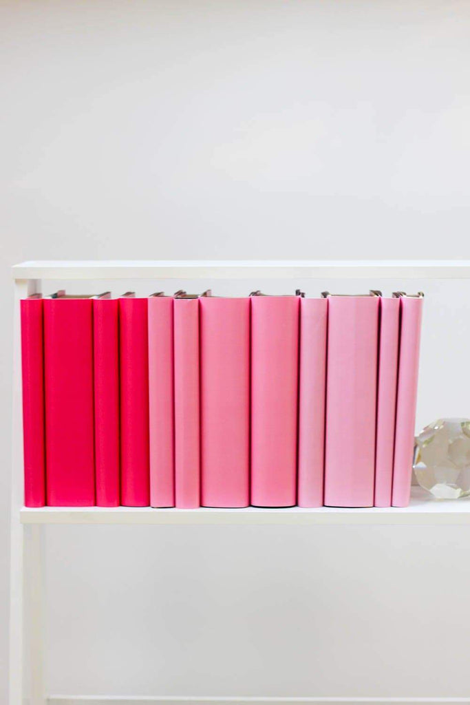 Set of styled pink books made with pink book covers